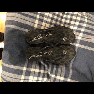 Michael Kors Black wedge flip flops